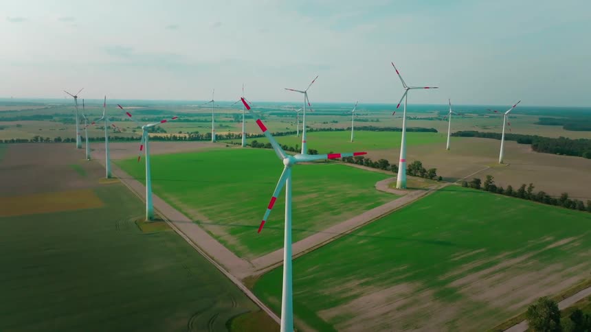 Turbines stand tall above the land