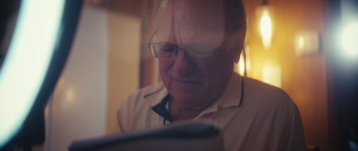 The man reads instructions for lighting equipment