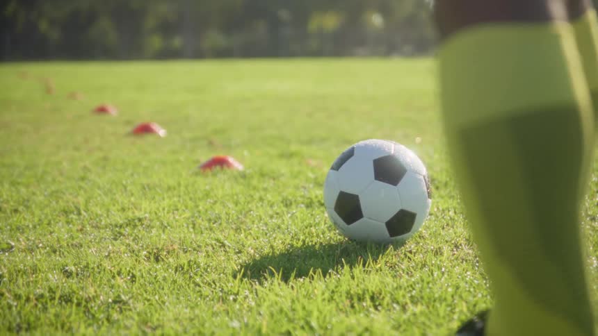 A soccer ball outdoors on a field