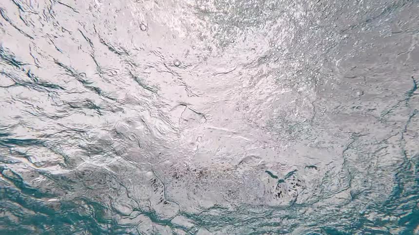 Droplets fall onto water