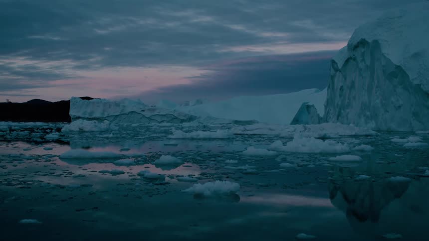 Icebergs and melting ice floating off the arctic coast