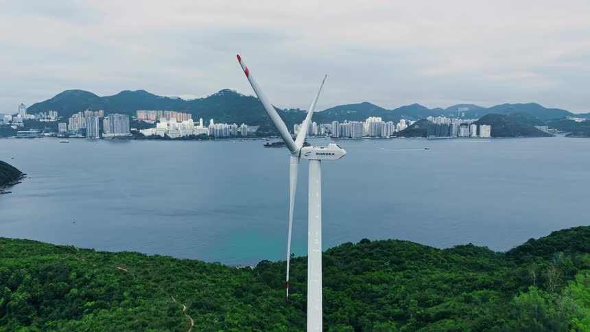 A turbine rotating in the wind