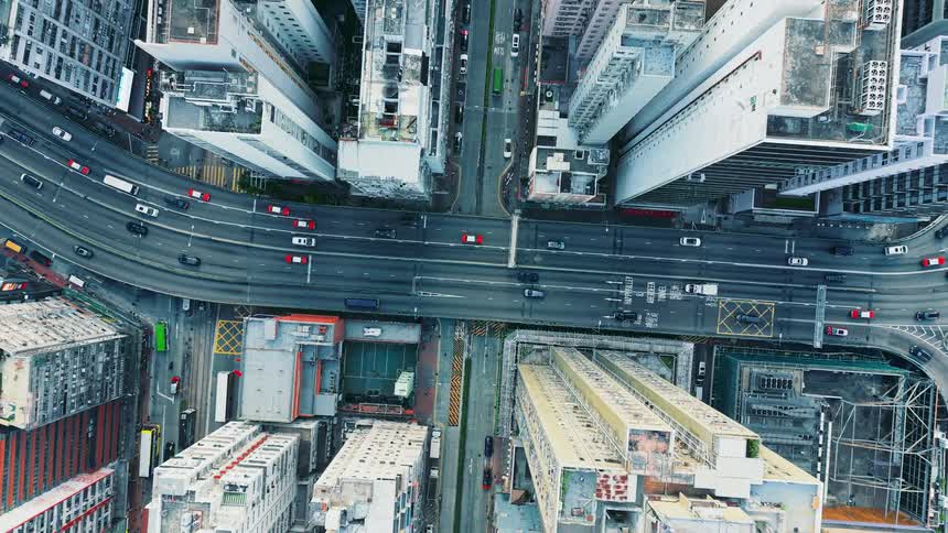Aerial of a busy highway in a metropolitan city during daytime