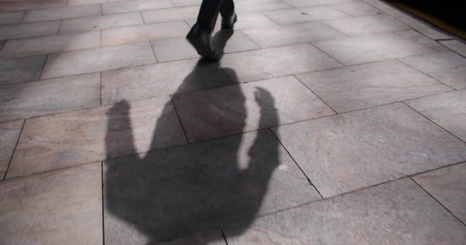 A person walking outdoors in a city