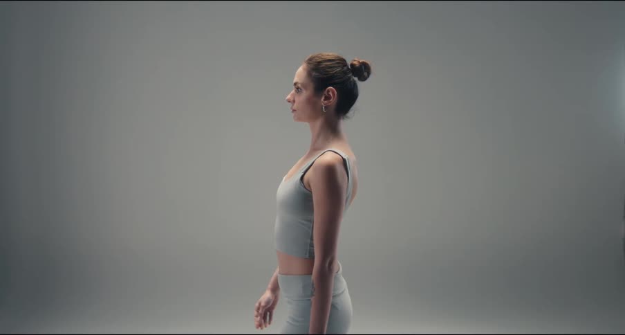 A woman walking in a room