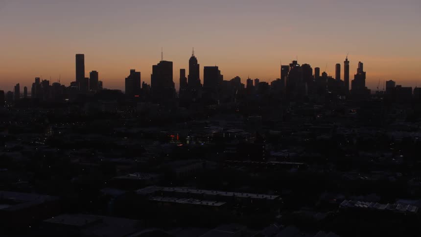 A city skyline at sunset