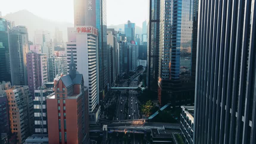 Aerial Sunrise Of Hong Kong Skyline and business buildings in a city