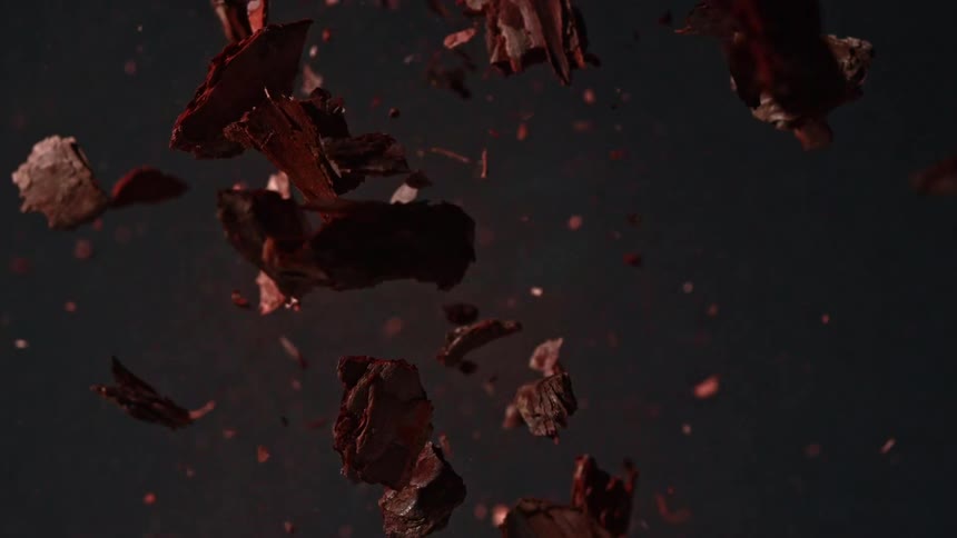A brown object shatters