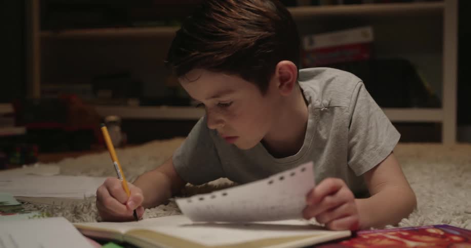 A child writing in a book