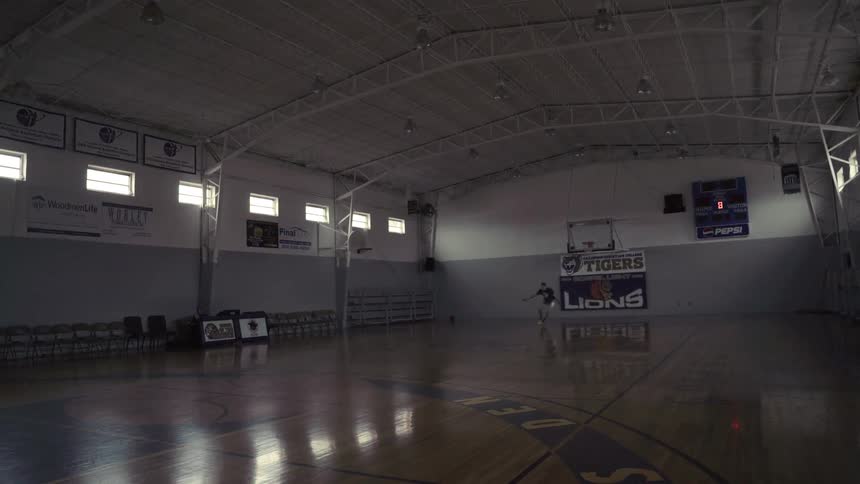 Man sprinting in a gym