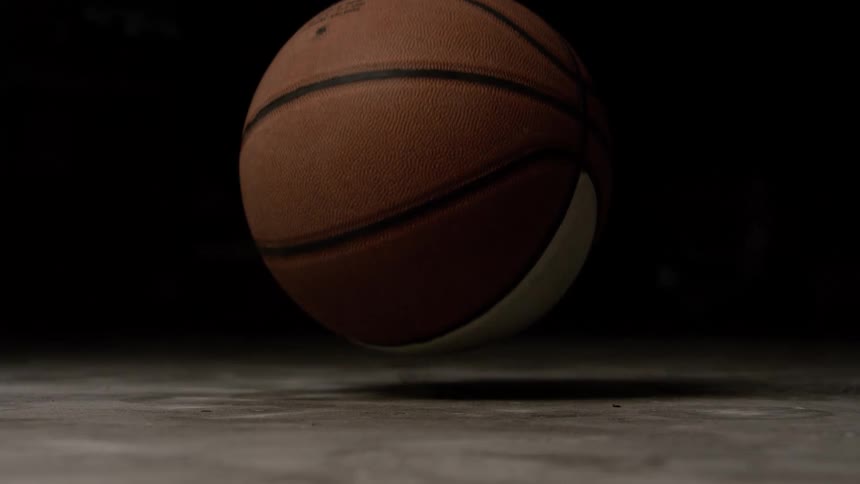 Basketball bouncing on the ground