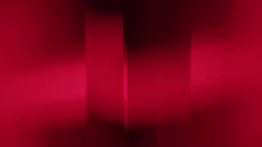 Blurred red background with vertical shapes