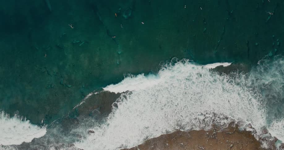 Large waves crash on the shore