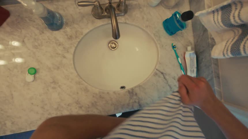Person applying deodorant