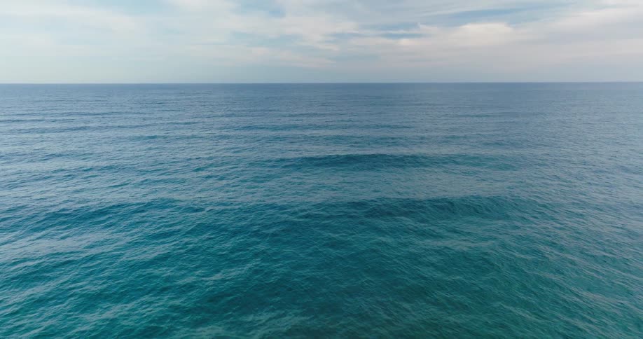 An aerial view of waves on the ocean