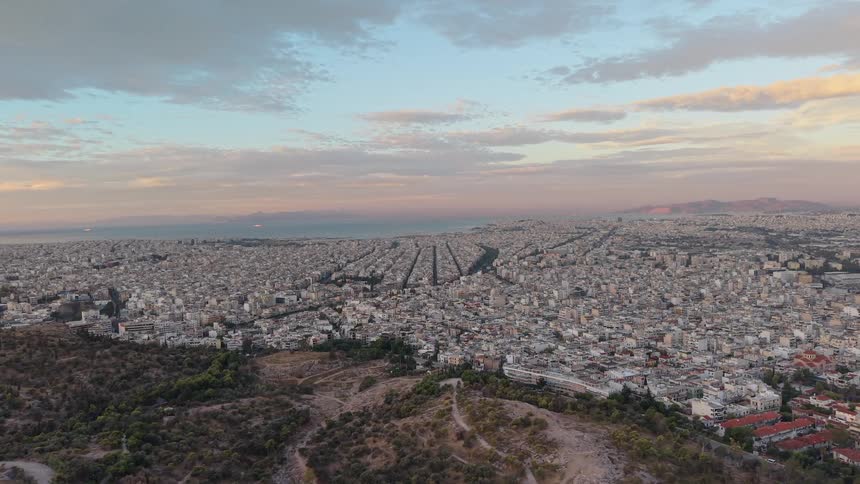 An aerial view of a city at dusk