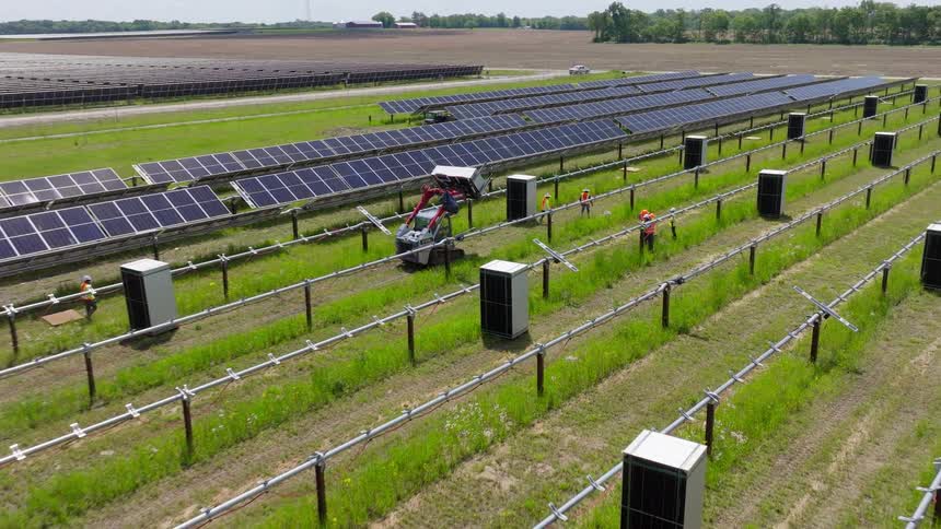 Utility crew working on a solar farm