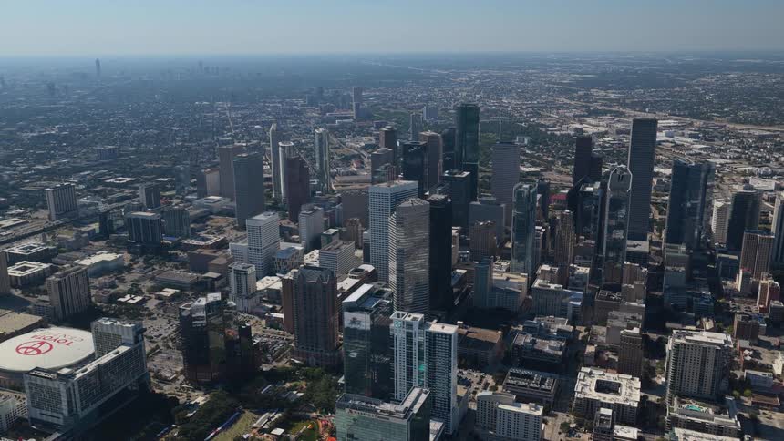 Aerial of skyscrapers in a metropolis on a summer day