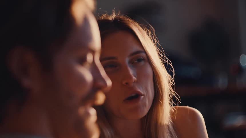 A man and woman talking to each other