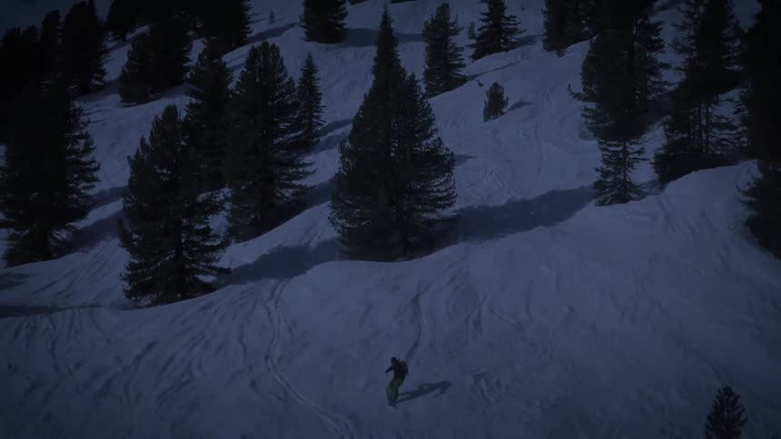 A person snowboarding down a mountain