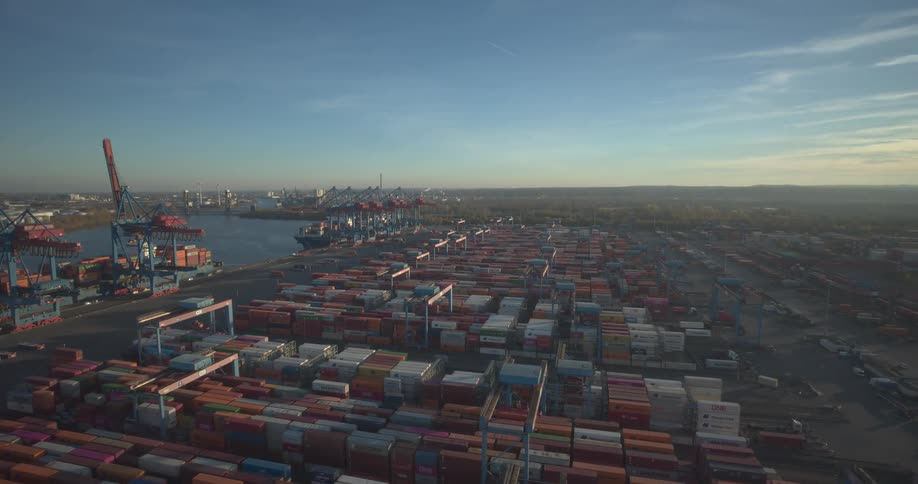 An aerial view of a shipping terminal full of shipping containers