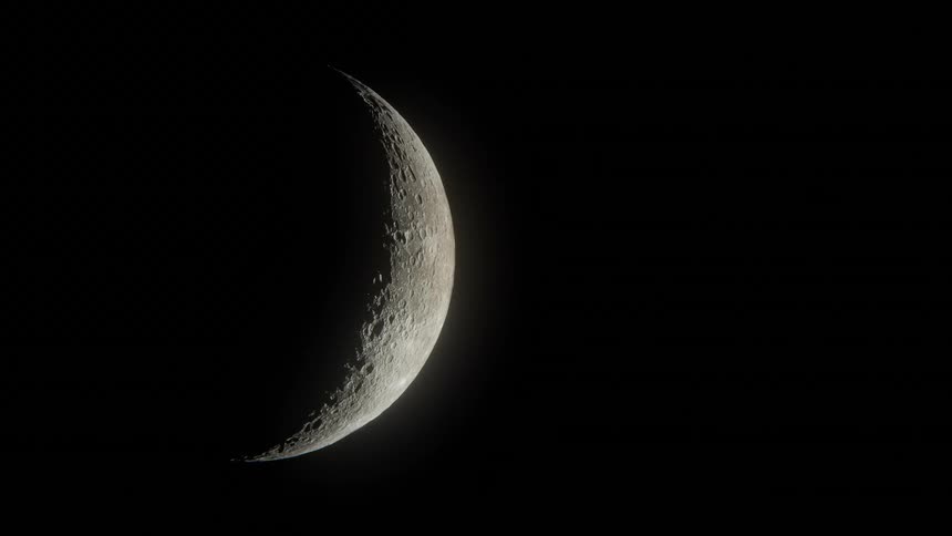 Close up of the moon reflecting light in the sky at night