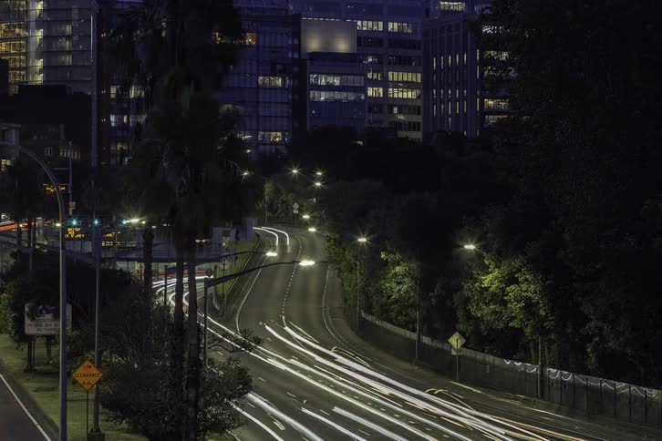Aerial of busy roads in a metropolitan city at night