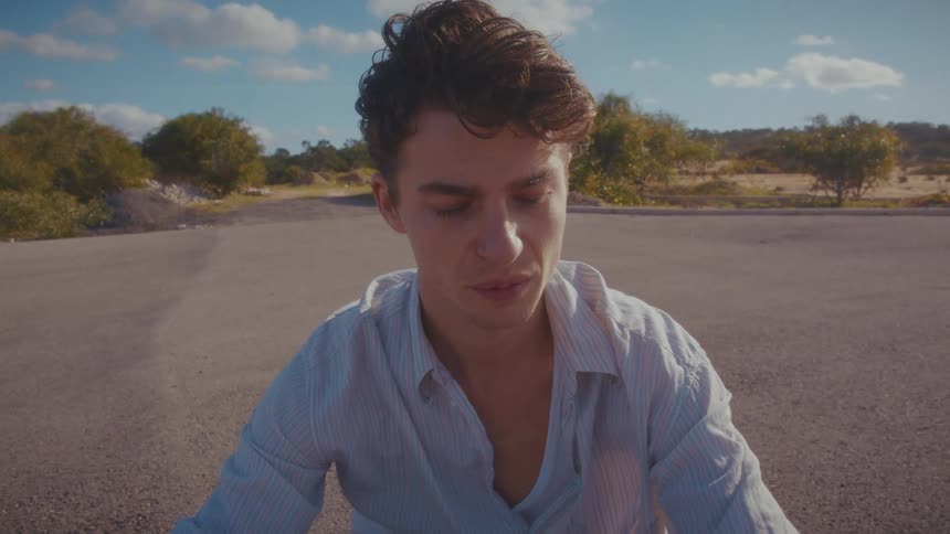 A portrait of a man outdoors
