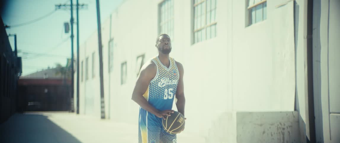 Man scoring points on a basketball court