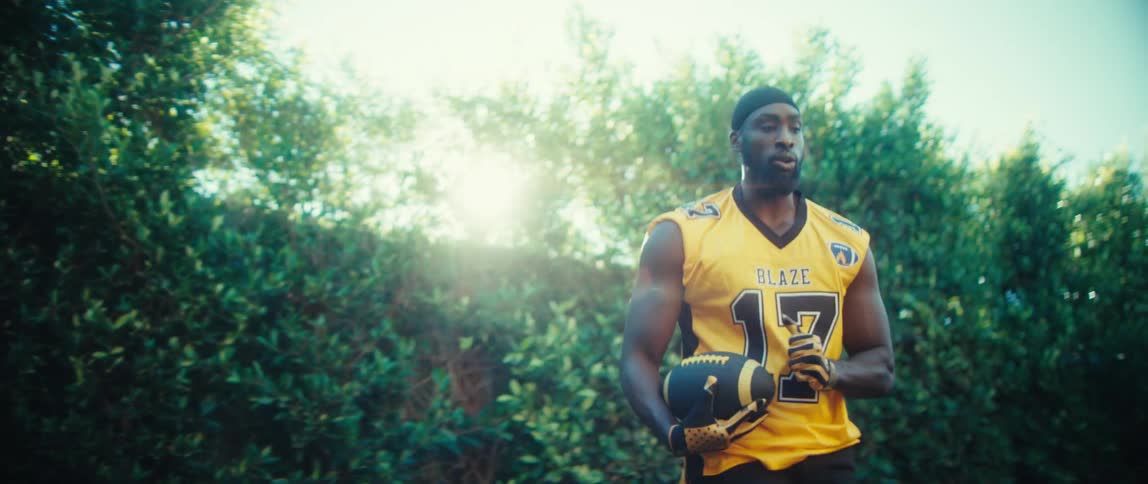 A man catches a football