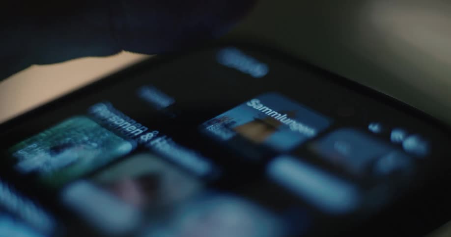 A person scrolling on a smartphone screen