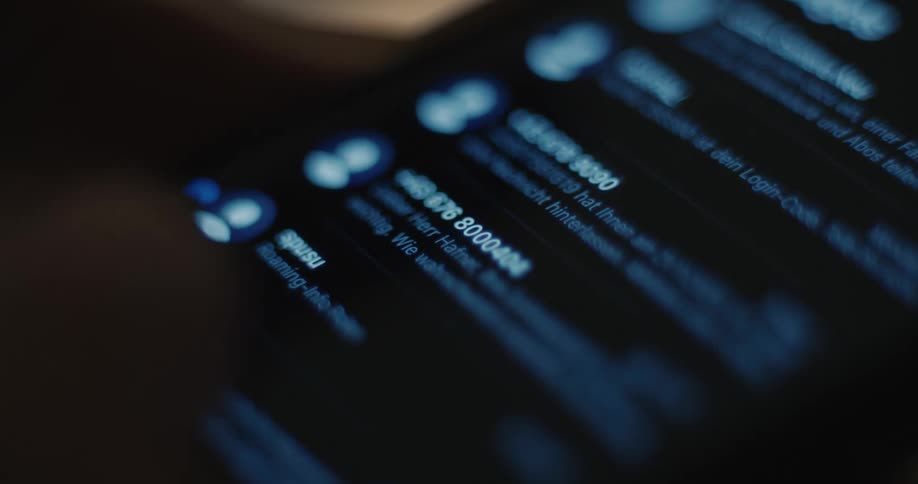 A person scrolls through their phone while messaging