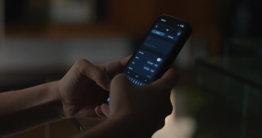 Woman uses the calendar app on her smartphone