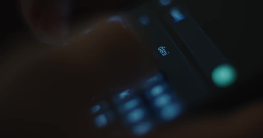 Woman types a message in the messaging app on her smartphone