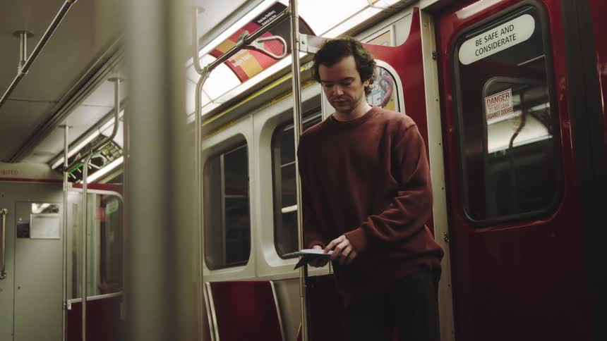 Person standing inside subway