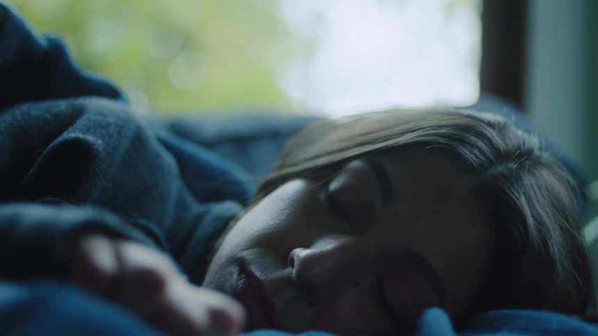 A woman laying around resting