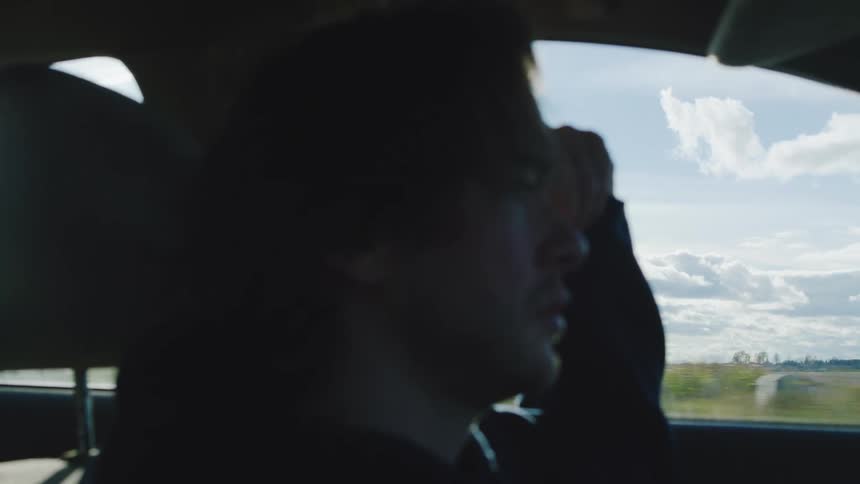 A man driving a car