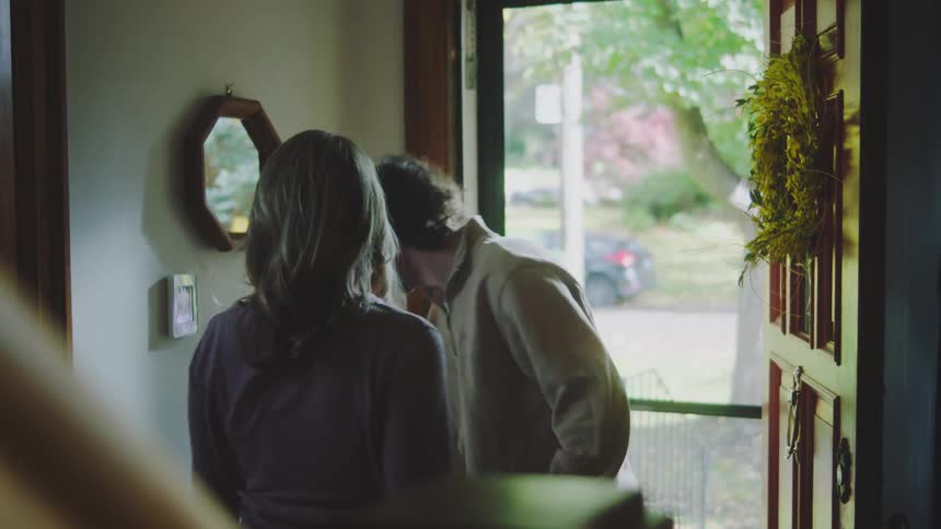 Mother receiving her son with a hug