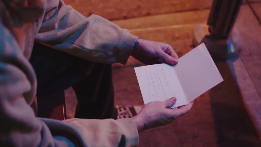 Man sitting looking at papers