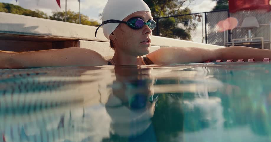 A woman swimming in a pool