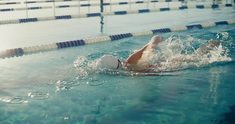 A woman swimming in a pool