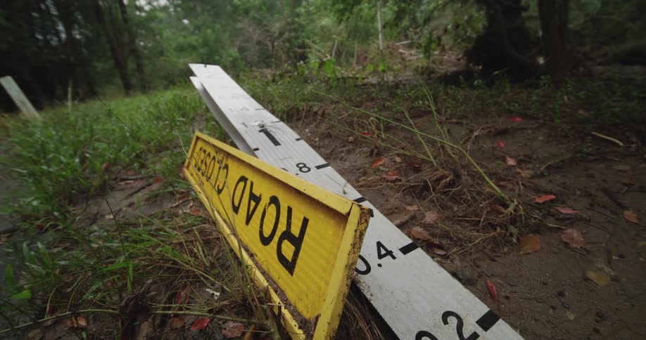A view of a sign that has been knocked over