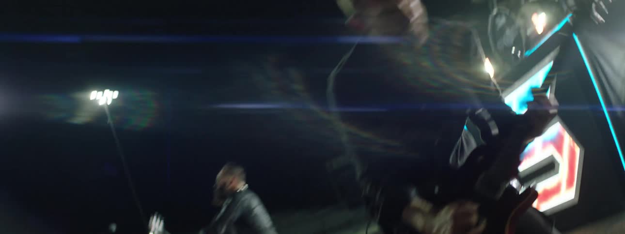 Band performing outdoors at night