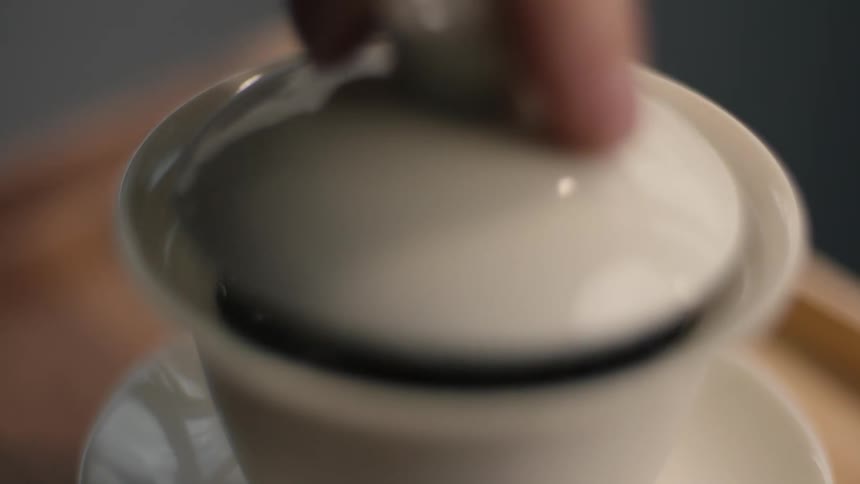 Tea leaves are steeping in the container