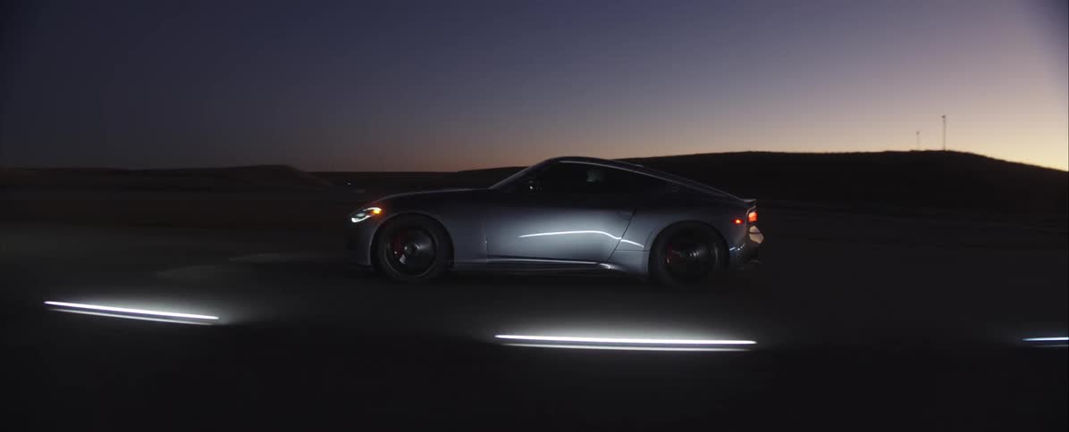 A car driving at dusk