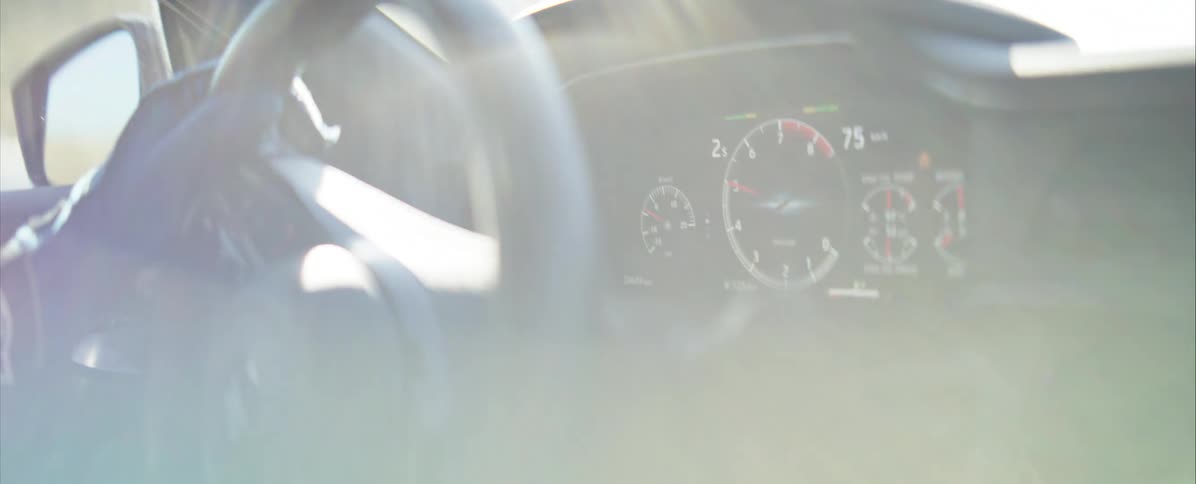 A person driving a car around a race track