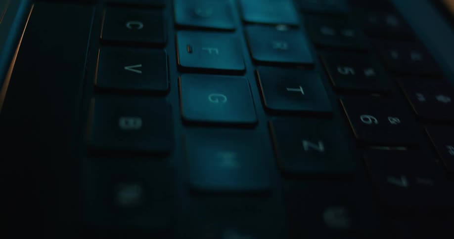 A laptop with a keyboard