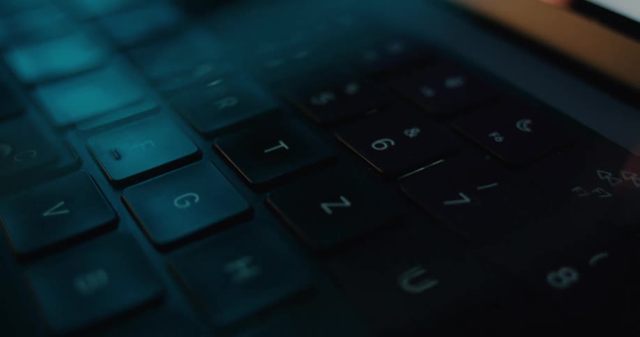 The keyboard on the laptop is black