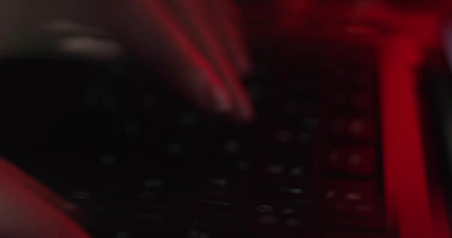 A person typing on a keyboard