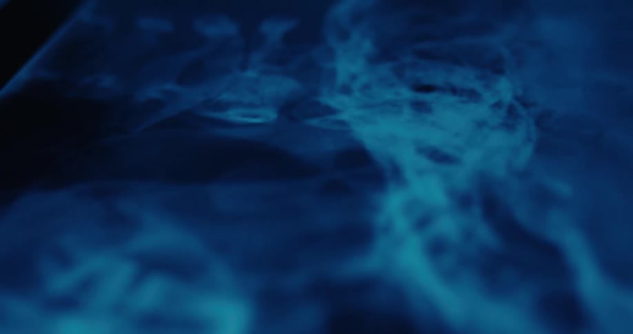 Bluish xray of human spine highlighting vertebrae and lateral skeletal structure